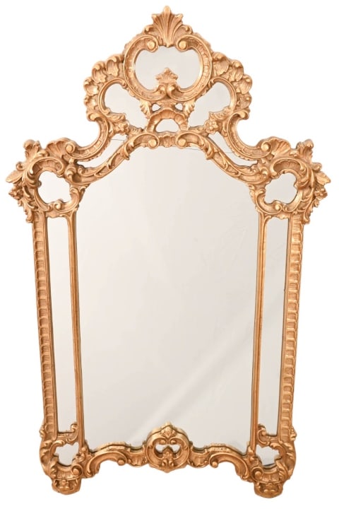 Italian Hand Carved Gilt Wall Mirror: Italian Hand Carved Gilt Wall Mirror.Crack in mirror.Measures 51 inches x 31 inches x 2inches.