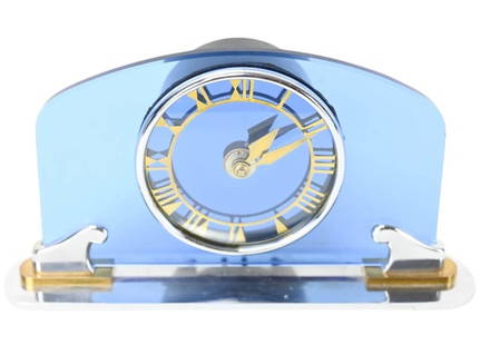Art Deco Bem Ltd. Blue Glass Brass Electric Clock: Art Deco Bem Ltd. Blue Glass and Brass and Chrome Electric Clock. Clock is not currently working, but is wired. There is a chip to the glass near the numberal II. Measures 6 inches x 10 inches x 4 inc