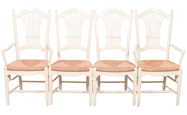 4 French Country Carved Rush Seat Dining Chairs: 4 French Country Hand Carved Rush Seat Dining Chairs.2 with Arm and 2 side chairs.Measures 42 inches x 24 inches x 18 inches seat height 18 inches.