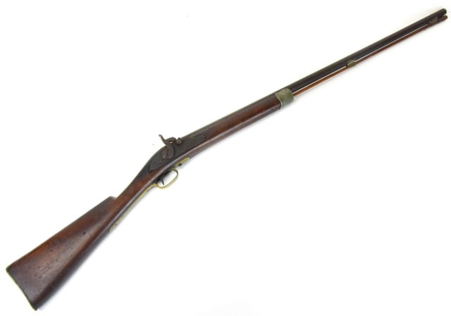 Civil War Springfield Musket Smooth Bore Rifle: Antique Civil War Springfield Musket Smooth Bore Rifle. 50 inches long with brass and steel mounts. Dated 1865, Carved into the Stock.
