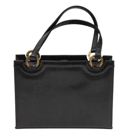 Vintage Don Lester Black Alligator Skin Handbag: Vintage Don Lester Black Alligator Skin Handbag with Gold Tone Trim. Measures 13 inches x 9.5 inches including handles.