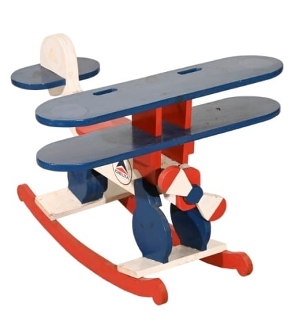 Vintage Hand Carved & Painted Ride On Plane: Vintage Hand Carved & Painted Child's Ride On Prop Plane. Measures 23 inches x 32 inches x 30 inches.