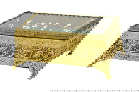 Regency Style Ormolu Beveled Glass Jewelry Box: Regency Style Ormolu Beveled Glass Jewelry Box. Measures 2 inches x 4.5 inches x 3.25 inches.