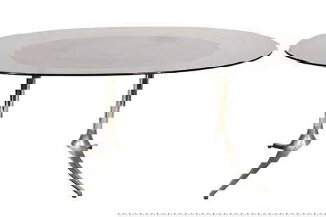 Howell Modern Space Age Smoked Glass Dining Table: Howell Modern Space Age Smoked Glass Dining Table with Chrome Legs.Measures 40 inches x 65 inches x 42 inches.