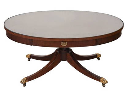 Federal Style Mahogany Glass Top Coffee Table: Federal Style Hand Carved MahoganyCoffee Table with Glass Top and Brass Lion Feet on Casters.Measures 17.5 inches x 35.5 inches x 22 inches
