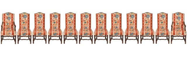 12 French Baroque Carved Upholstered Dining Chairs: 12 French Baroque Hand Carved Custom Upholstered Kneeler Fourchere Dining Chairs with Nail Head Trim.Measures 44 inches x 21 inches x 21 inches x 19 inches.