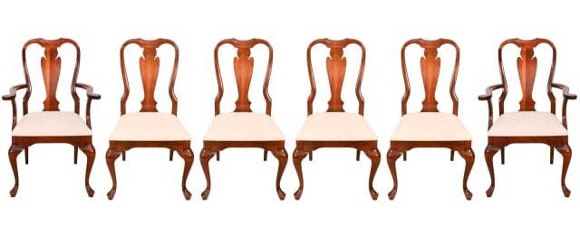 6 Queen Ann Style Carved Upholstered Dining Chairs: 6 Queen Ann Style Hand Carved Custom Upholstered Dining Chairs. Needs Refurbishment.Measures 35 inches x 29 inches x 18 inches, seat height 19 inches.