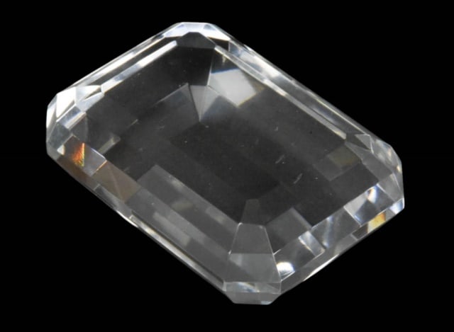 Tiffany & Co Crystal Bezel Cut Paperweight: Tiffany & Co Crystal Bezel Cut Paperweight. Measures 4 inches x 2.5 inches.