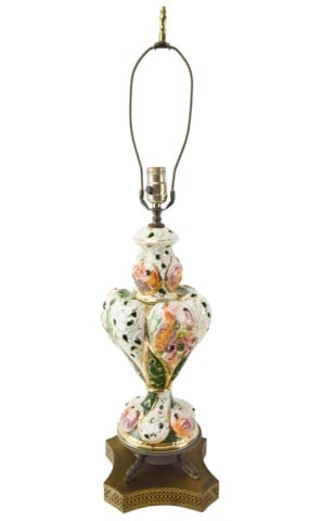 Capodimonte Style Porcelain Lamp w Brass Base: Capodimonte Style Porcelain Lamp w Brass Base. Measures 32 inches x 10 inches. There is a small crack to porcelain base.