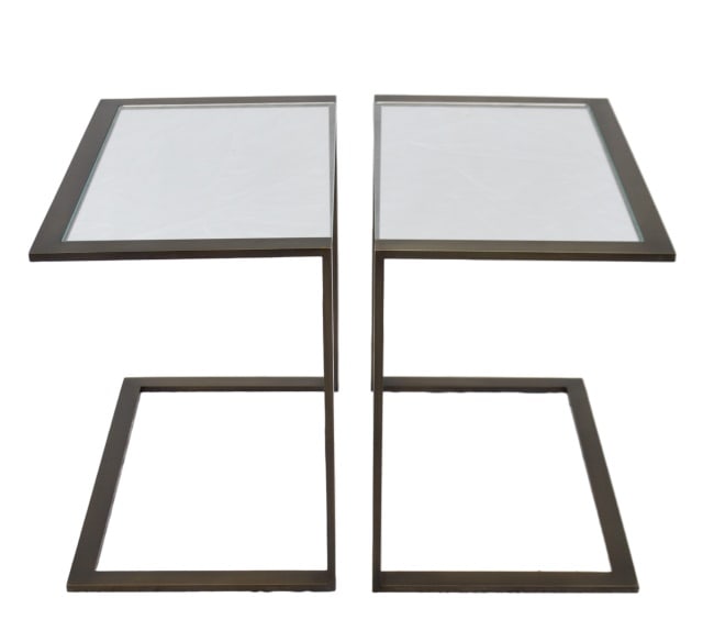 Pair Minimalist Cantilever Metal Accent Tables: Pair Minimalist Cantilever Metal Accent Side TablesMeasures 21 inches x 24 inches x 15 inches.