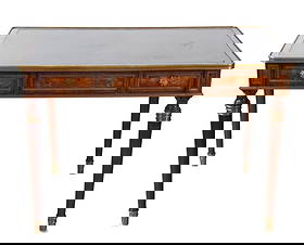 Theodore Alexander Leather Inset Writing Table: Theodore Alexander Brass Mounted Leather Inset Writing Surface Table with Three Frieze Drawers on Turned Legs.Measures 30 inches x 43 inches x 26 inchesLeather needs conditioning. Sold as is.