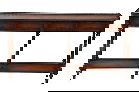 Theodore Alexander Louis XVI Console Table: Theodore Alexander Louis XVI Console Table. Featuring four frieze drawers, galleried top and undertier with verdigris brass mounts and turned fluted legs.Measures 33 inches x 58 inches x 11 inches.Som