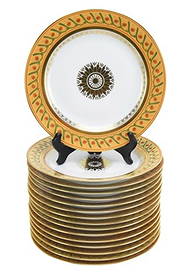 16 Tiffany Le Tallec Private Stock Dinner Plates: 16 Tiffany Le Tallec Private Stock Porcelain Dinner Plates. Each measures 10 inches in diameter. Some minor scratching to gold center emblem from fork use.