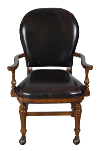 Louis XV Style Carved Leather Upholstered Armchair: Louis XV Style Carved Leather Upholstered Armchair on Casters.Measures 39 inches x 27 inches x 22 inches x 19 inches.