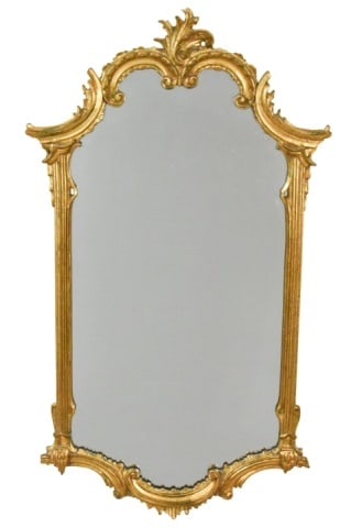 Italian Hand Carved Gilt Mirror: Italian Hand Carved Gilt Mirror .Sticker: Made in Italy.Measures 45 inches x 25 inches x 1.5 inches*Piece Broken Off Top