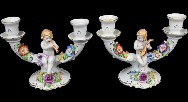 Schierholz Porcelain Capodimonte Style Candelabras: Vintage Schierholz Porcelain Hand Painted Capodimonte Style Candelabras Featuring Putti Playing Instruments. Each measures 7 inches x 9 inches.