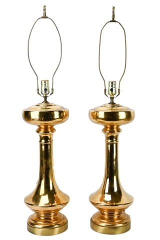 Pair Mid C Modern Porcelain Gold Table Lamps: Pair Mid C Modern Porcelain Gold Table Lamps with Brass Bases. Each measures 21 inches x 7 inches not including lamp harp. There is a small chip to back of base on one lamp.