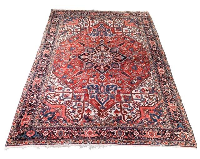 Heriz Oriental Hand Woven Wool Carpet: Heriz Oriental Hand Woven Wool CarpetMeasures 90 inches x 130 inches.
