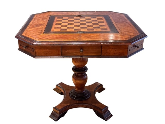 Theodore Alexander Ellery Game Table: Theodore Alexander Ellery Game Table. Includes carved wood chest pieces. Has some scratches but overall good condition. Sold as is.Measures 31 inches x 36 inches x 36 inches.