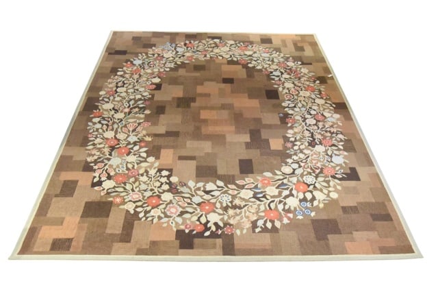 Elizabeth Eakins Floral Wreath on Geometric Rug: Elizabeth Eakins Floral Wreath on Geometric Rug. Patchwork like background rug.Measures 121 inches x 161 inches.