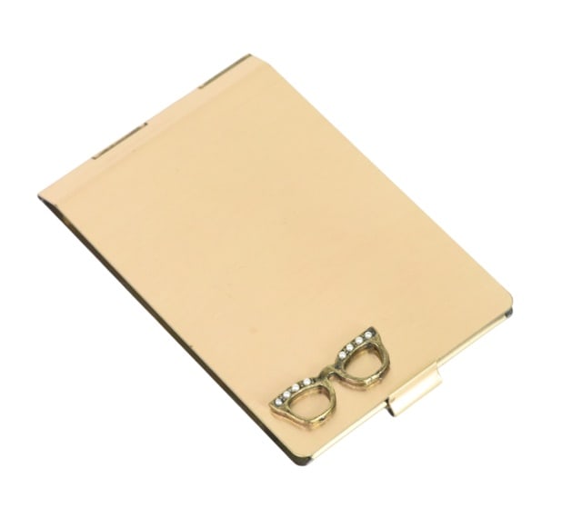 Vintage NS Gold Tone Eyeglass Compact Tissues: Vintage NS Gold Tone Eyeglass Compact Tissues.Measures 3.5 inches.