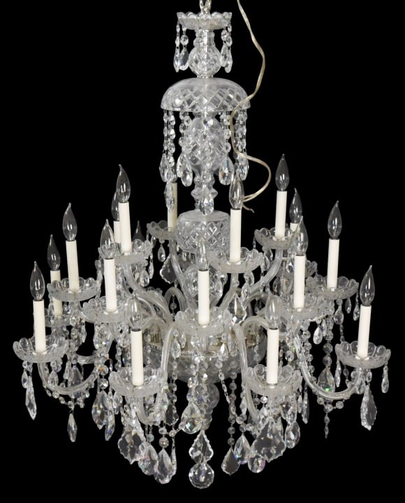 Art Deco Style Chandelier Dressed with Swarovski: Art Deco Style Chandelier Dressed with Swarovski Crystal. One arm is broken, needs repair. Sold as is.Measures 44 inches x 34 inches x34 inches.