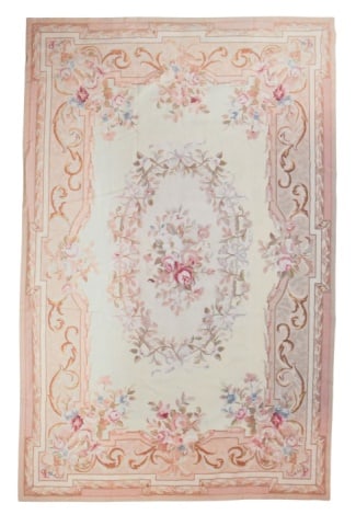 Hand Made Pink & Floral Needlepoint Carpet: Hand Made Pink & Floral Needlepoint Carpet Measures 71 inches x 107 inchesCarpet is faded. Please look at images carefully. Sold as is.