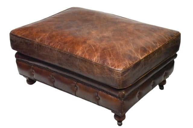 Chesterfield Style Leather Ottoman Nail Head Trim: Chesterfield Style Leather Ottoman with Nail Head TrimMeasures 18 inches x 38 inches x 28 inches. Consistent with age and use. Please look at images carefully. Sold as is.