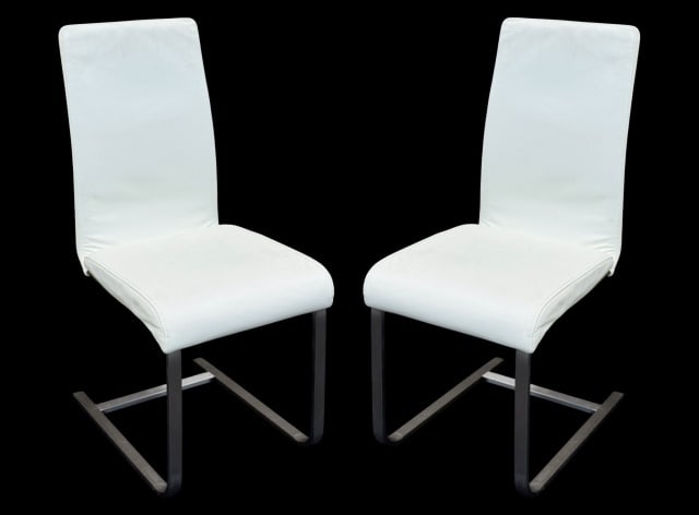 6 Modern Stainless Steal Leather Chairs: 6 Modern Stainless Steal Leather Upholstered Chairs Measures 38 inches x 18 inches x 20 inches x 19 inches. No rips or tears but need to be cleaned. Sold as is.