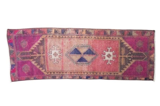 Vintage Turkish Rug with Geometric Motifs: Vintage Turkish Rug with Geometric Motifs in Pink and Blue Hues.Measures 17.5 inches x 49 inches.