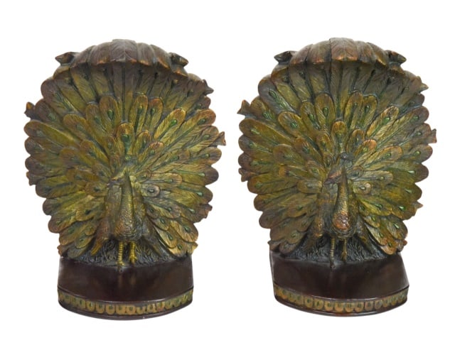 Pair Decorative Peacock Bookend: Pair Decorative Peacock Bookend. Crafted from resin with detailed etching and hand painted finish.Measures 7.5 inches x 6.5 inches x 4 inches.