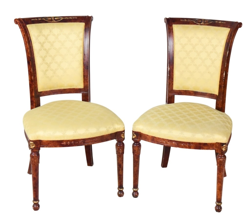 Pair Egyptian Revival Carved Upholstered Chairs: Pair Egyptian Revival hand Carved Custom Upholstered Chairs. Measures 37 inches x 20 inches x 18 inches, seat height 18 inches.