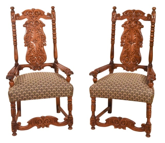 Pair Jacobean Style Carved Upholstered Armchairs: Pair Jacobean Style Hand Carved Oak high back and Turned Legs Custom Upholstered Armchairs.Measures 45 inches x 25 inches x 22 inches, seat height 19 inches.