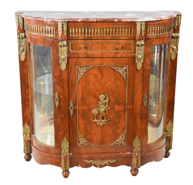 Early 20th C. Louis XVI Demilune Cabinet/Credenza: Early 20th Century Louis XVI Demilune Red Marble Top Cabinet / Credenza with Gilded Ormolu Mounts with Key. Please see all photos, mirrored shelf is shattered. Sold as is.Measures 47 inches x 48