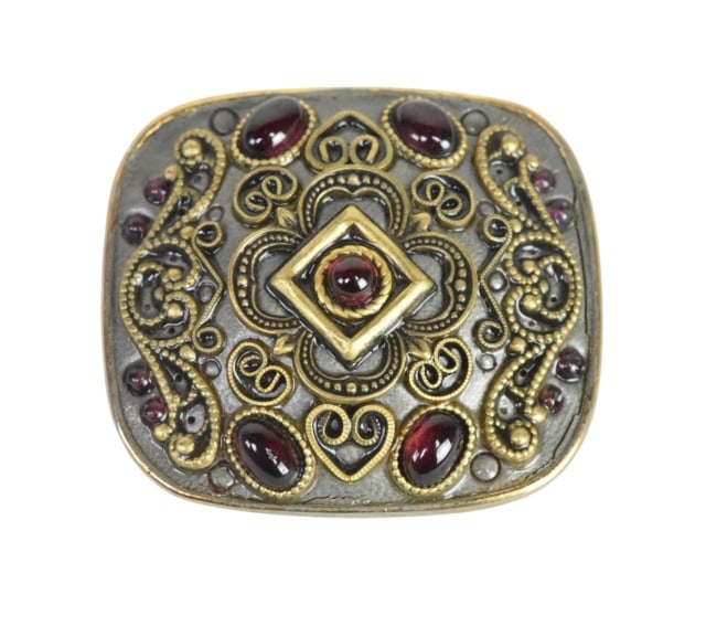 Vintage Michal Golan Ornate Gold Plated Brooch: Vintage Michal Golan Ornate Gold Plated Brooch with garnet Cabochons.Measures 1.5 inches.