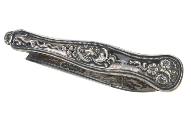 Antique Continental Sterling Silver Folding Knife: Antique Continental Sterling Silver Reposse Folding Knife. Open measures 5.5 inches.