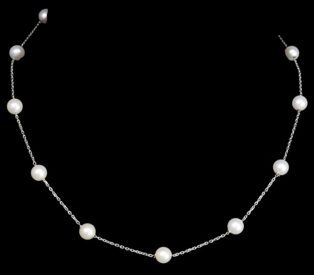 14K White Gold and Pearl Station Necklace: 14K White Gold and Fresh Water Pearl Station Necklace.Measures 16 inches long.