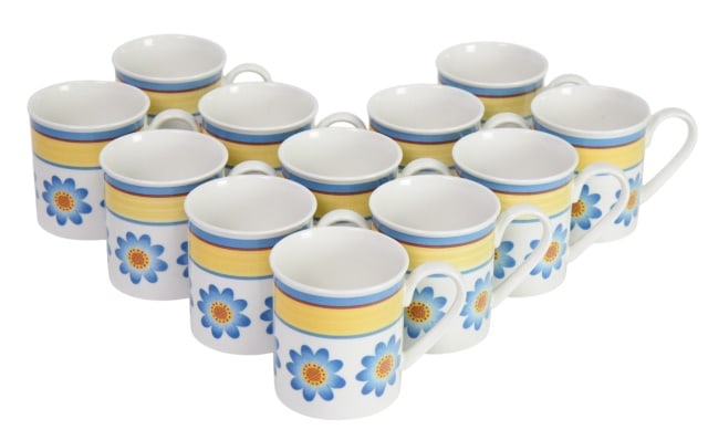 12 Villeroy & Boch Twist Dora Mugs: 12 Villeroy & Boch Twist Dora Mugs with Blue and Yellow Daisy Patterns.Measures 3.25 inches x 3.25 inches x 4.5 inches.