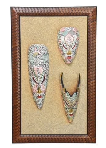 Three Indonesian Handcrafted Decorative Masks: Three Indonesian Handcrafted Framed Decorative Masks.Measures 41 inches x 25 inches x 5 inches.