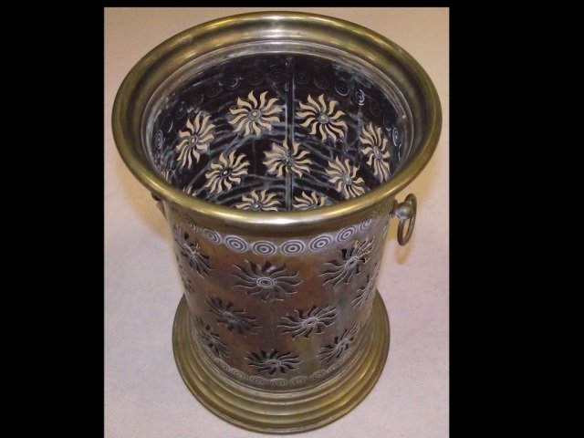 Antique Brass Umbrella Rack with Starburst Pattern: Antique brass umbrella rack with starburst pattern- excellent condition.