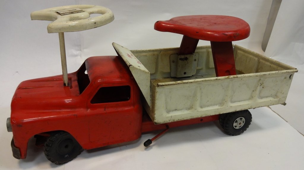 Structo Midcentury Red Dump Truck: Structo midcentury dump truck. 20 L x 8" W x 9 1/4" H, good used condition."