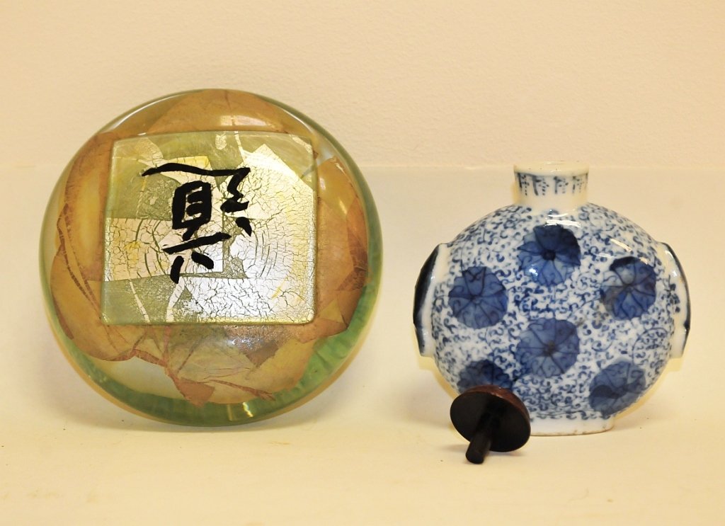 Asian- Signed Paperweight & Porcelain Snuff w/Cap: Lot of two Asian pieces: one signed glass paperweight and one antique porcelain snuff bottle with cap.