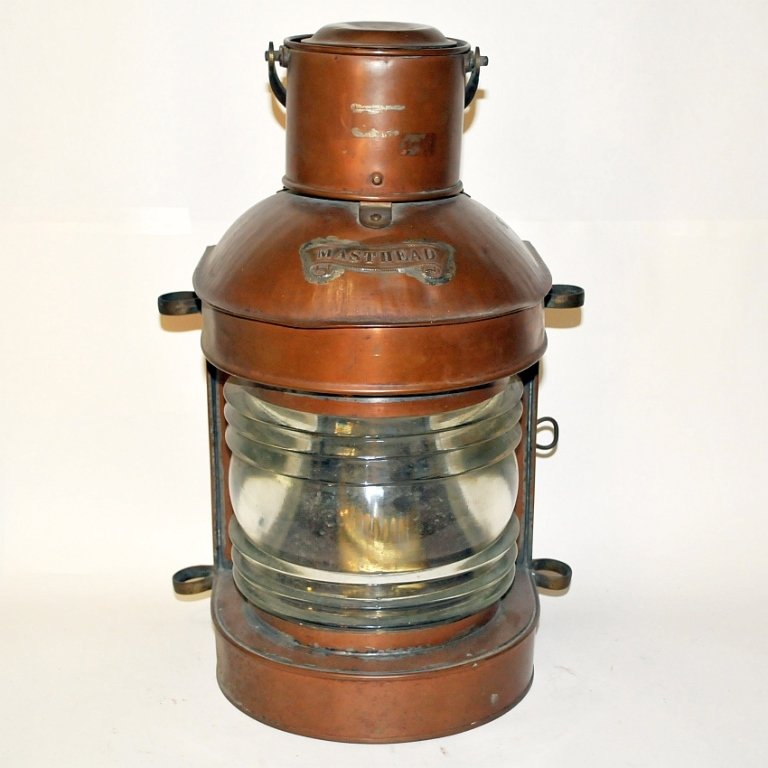Antique Large Brass Ship Mast Light: Antique brass, tin, and copper ship mast light with plaque reading "MASTHEAD" on front. 8" L x 8" W x 16" H, very good used condition.