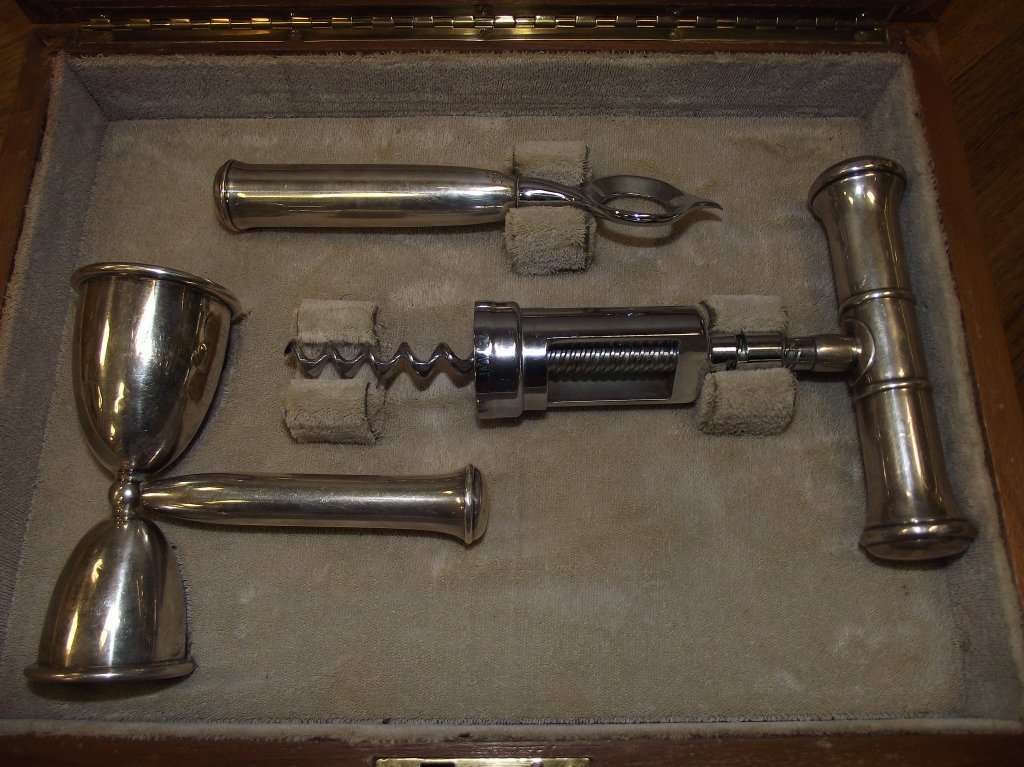Box of 3 Sterling-Handled Bartending/Wine Tools: Boxed set of sterling-handled bartending/wine tools. Includes a jigger, bottle opener, and corkscrew, monogrammed box measures 11 1/4" L x 8 1/2" W x 4" H, very good vintage condition.