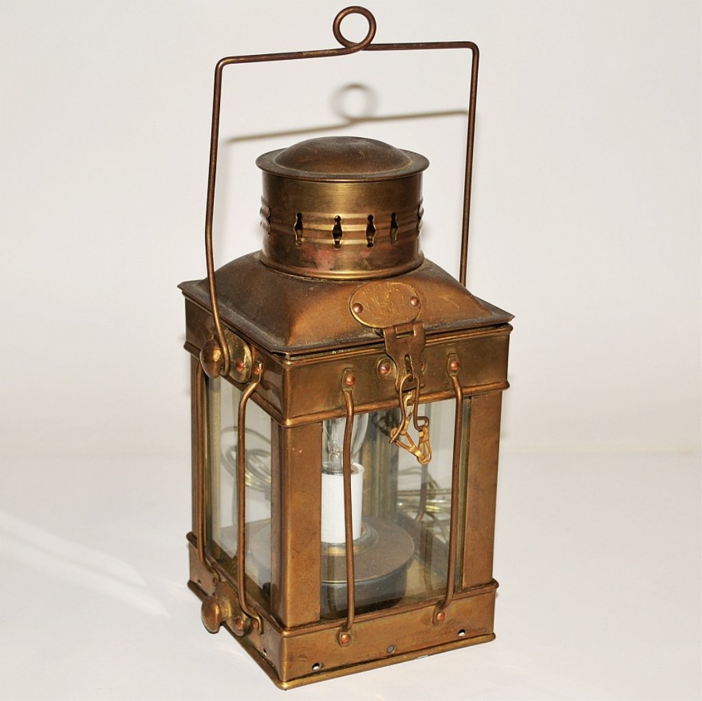 Wired Diminutive Brass Lantern with Door & Handle: Diminutive brass lantern with door and handle. Wired for 110 volt lighting. Nameplate reads "Neptune IF" with and image of Neptune. 11" H x 5" L x 5" W, very good vintage condition.