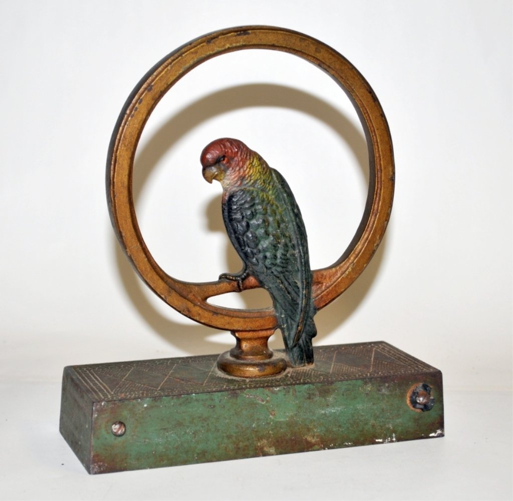 Antique Bradley & Hubbard Bronze Doorstop- Parrot: Bradley & Hubbard enamel and bronze doorstop, parrot motif. 7" L x 2 1/2" W x 8" H, very good antique condition.