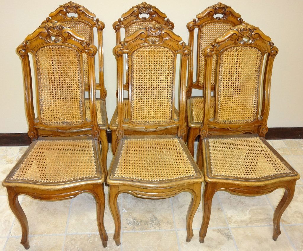 Set of 6 Victorian Walnut+Caned Dining Room Chairs: Set of six Victorian walnut and caned dining room chairs. 18 3/8" L x 16 1/8" W x 41 7/8" H, very good used condition.