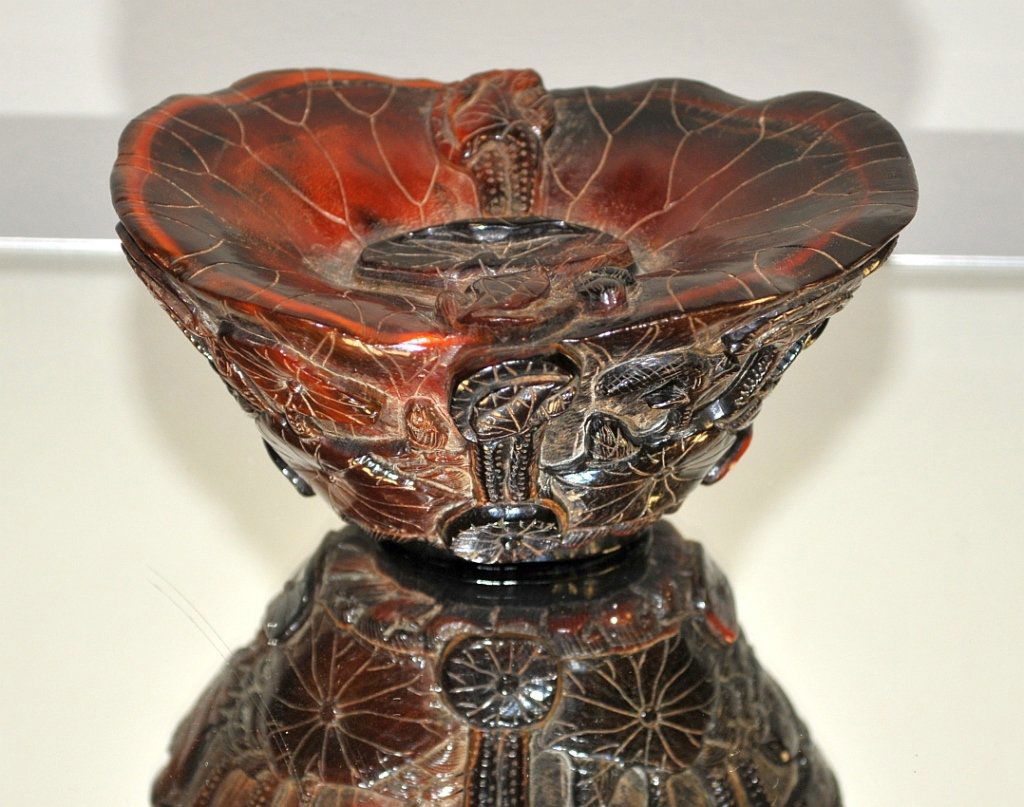 Antique Chinese Carved Horn Lotus-Form Cup: Antique Chinese carved horn lotus-form cup. Burgundy color, 2 1/4" H x 4 1/2" W x 3 1/2" D, very good used condition.