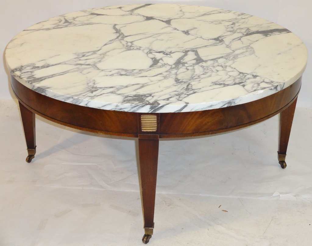 Jansen-Style Round Coffee Table with Marble Top: Jansen-style round coffee table with marble top and wheels. 34" diameter x 16" H, very good vintage condition.