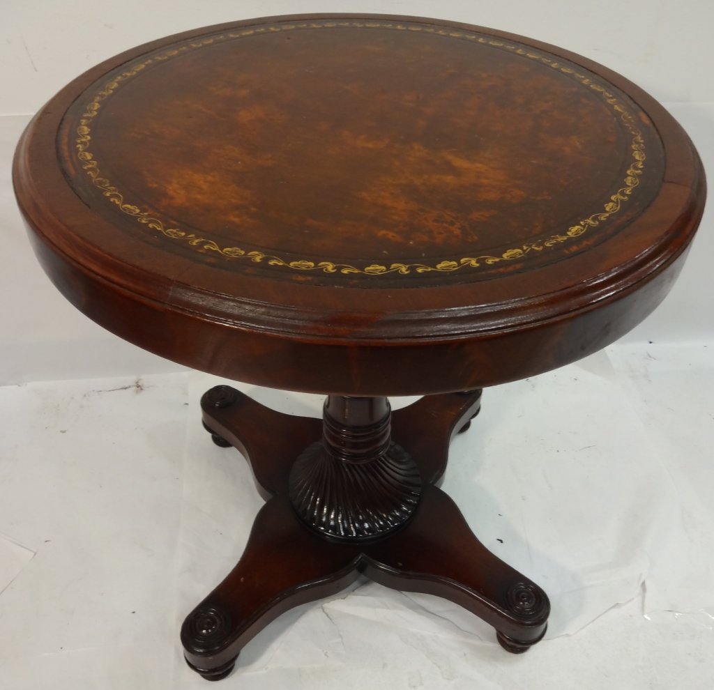 Art Deco Mahogany Circular End Table: Art Deco mahogany circular end table. Features a gilt filigree border, four drawers, and a pedestal base. 27" diameter x 28 5/8" H, very good antique condition.